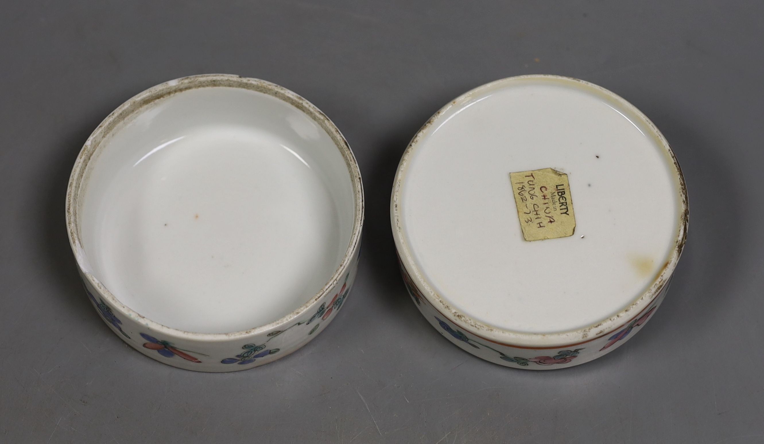 A 19th century Chinese famille rose box and cover, Liberty retail label, 9.5 cms diameter.